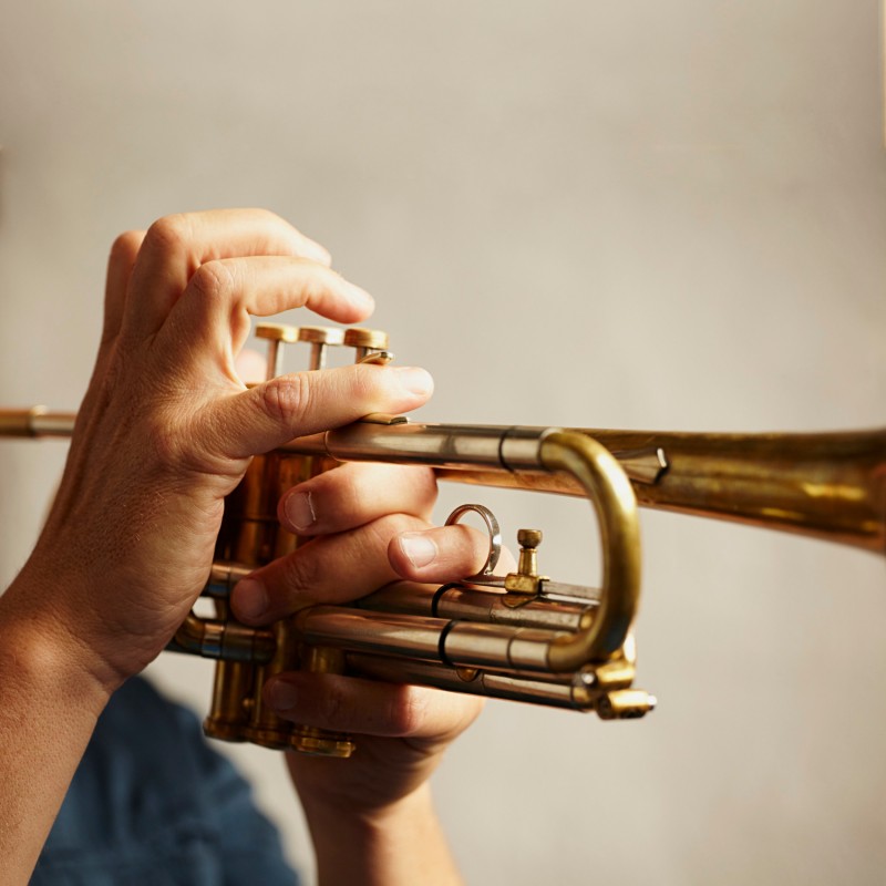 Musician playing a brass trumpet